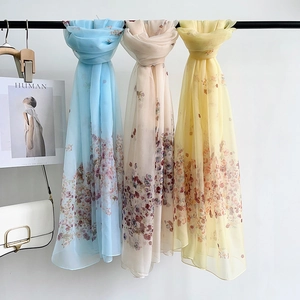 Lightweight floral chiffon scarves in blue, beige and yellow for summer protection