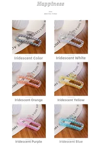 Detail of six geometric shark hair clips with holographic laser texture in various colors