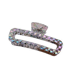 Iridescent crystal rectangle hair claw clip for women in rainbow finish on white background