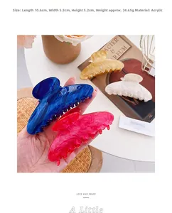 Detail showing high-quality marble pattern acrylic hair claw clip with size measurements