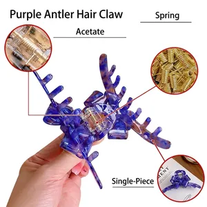 Blue marble acetate bow hair claw clip with detailed gold plating spring mechanism