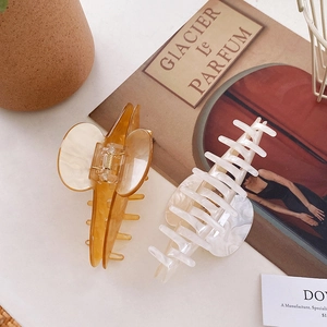 French vintage acetate hair claws in amber brown and marble white for thick hair