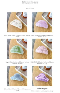 Detailed view of acetate flower hair claws in six colors with rhinestone accents