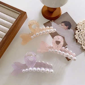 Elegant fishtail hair claws with pearls in champagne pink and lavender acetate finish