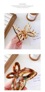 Detail of golden hollow butterfly hair claw clip with dark brown tortoiseshell resin finish