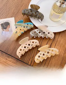 Detailed set of acetate hollow hair claws in tortoiseshell and marble patterns