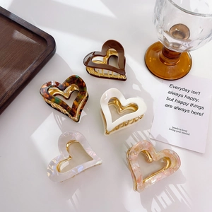 Elegant heart-shaped acetic acid hair claws with gold metal clips in five stylish colors