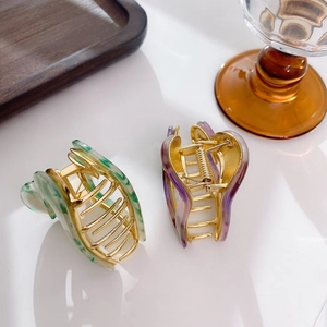 Elegant marble pattern hair claws with gold metal frame in green and pink colors