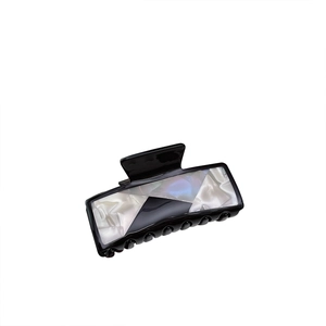 Large acetate square hair claw clip with black and marble patchwork design