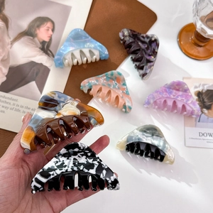 Elegant large triangle hair claw clips in marble acetate for thick hair styling