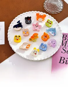 Assortiment de pinces à cheveux animaux marins colorés en résine brillante décorée