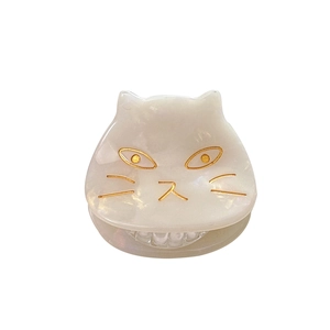 Cute cream cat acetate hair claw clip for side bangs with golden face details