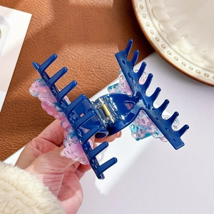 Navy acetate hair claw clip with light blue lace resin accents for elegant styling