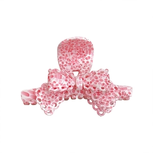 Pink and white patterned acetate hair claw clip with sweet bow design for women