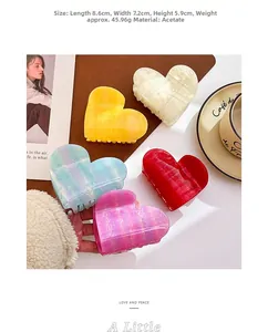 Detailed size specifications of heart-shaped acetate hair claws in five colors