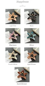 Star-shaped acetate hair claws in various colors with golden metal teeth detail