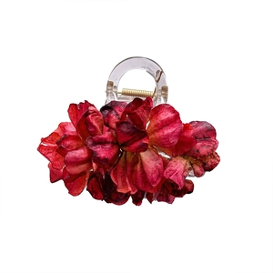 Elegant dark red camellia hair claw clip with transparent base for women styling