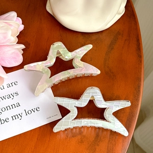 Star shaped acetic acid hair claw clips in marble and mosaic patterns for women