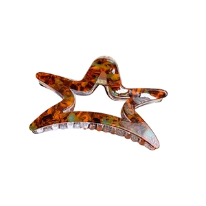 Star-shaped acetate hair claw clip with brown marble pattern for versatile hairstyling
