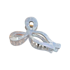 Iridescent checkered acetate hair claw clip with large butterfly bow design