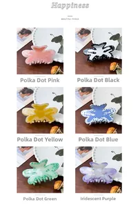 Detailed grid view of butterfly claw clips in six colors with stylish polka dot patterns