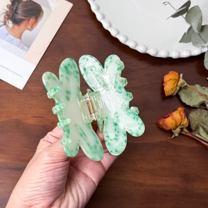 Elegant marble pattern acetate hair claw clip for high ponytail styling and updos