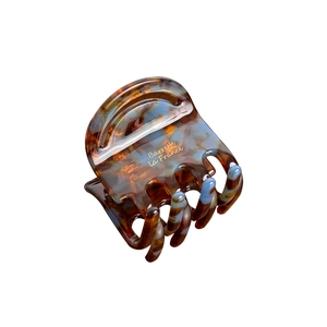 Elegant tortoise and blue acetate hair claw clip with golden Barrette la France text