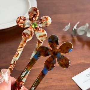Elegant flower hair pin set with amber and tortoiseshell acetate texture and rhinestones