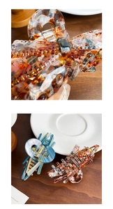 Detail of tortoise shell acetate hair claws with premium metal spring in a retro style