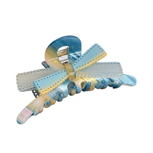 Elegant cellulose acetate butterfly hair claw clip with blue marble pattern for women