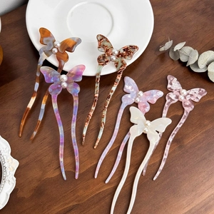Elegant U-shaped butterfly acetate hair pins with pearls in six assorted marble patterns