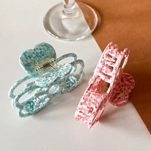 Elegant floral acetate butterfly hair claw clips in blue and pink for stylish updo hair