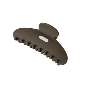 Chic coffee-colored matte resin shark hair claw clip with silver metal plate logo