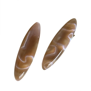 Brown marble pattern acetate hair clips in long oval shape with elegant glossy finish