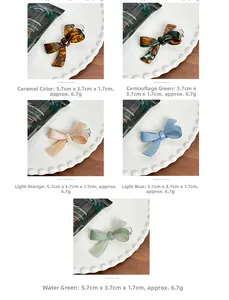 Detailed view of 5.7cm acetate bow hair clip showing varied colors and dimensions