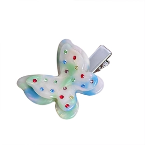 Sparkling rhinestone butterfly hair clip in iridescent gradient acetate with metal duckbill base