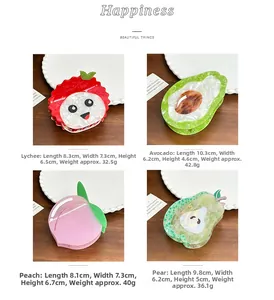 Detailed size chart for fruit-shaped acetate hair claws including peach and avocado styles