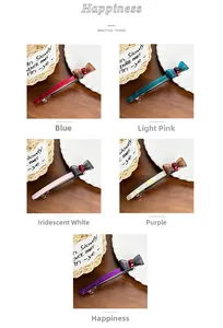 Detailed view of assorted colors acrylic bow hair clips with metallic gold emblem accents