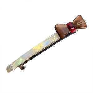 Elegant rectangle acetate hair clip with pearlescent finish and handmade bow detail