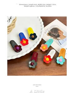 Detailed close-up showing acetate flower hair clips with size dimensions and 4cm length