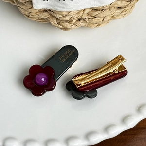 Floral acetate hair clip set in dark red and black with gold France handmade lettering