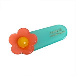 Chic acetate hair clip with teal base and orange floral design for women and girls