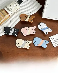 Detailed view of colorful cartoon poodle hair clips in six vibrant acrylic colors