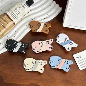 Set of six colorful puppy-shaped acetate hair clips in assorted pastel colors for women