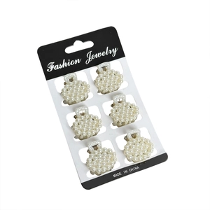 Lot de 6 mini pinces à cheveux en perles blanches, barrettes à perles rondes sur fond blanc