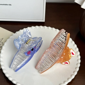 Cute butterfly hair claws in pastel blue and pink colors for women thick hair styling