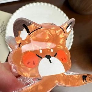 Cute orange fox hair claw clip with marble texture for thick hair and stylish updos
