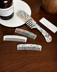 Detailed set of premium acetate hair combs with tortoiseshell and floral patterns
