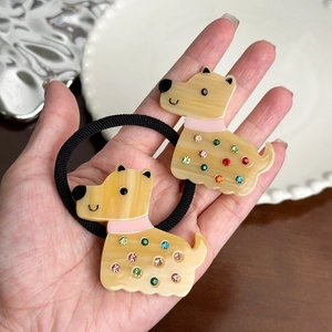 Lot de deux chouchous chien jaunes avec strass colorés et élastiques à haute résistance