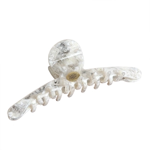 French vintage hollow hair claw with marble acetate pattern and gold metal logo